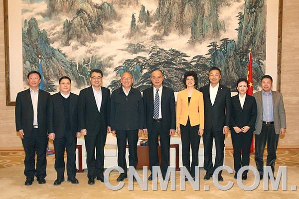 何文波会见交通银行董事长牛锡明